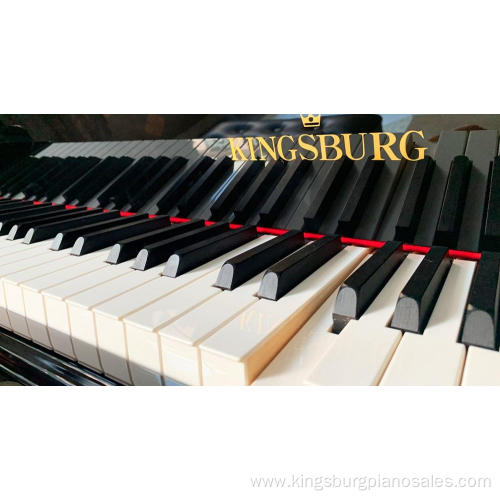 Top mounted vertical grand piano